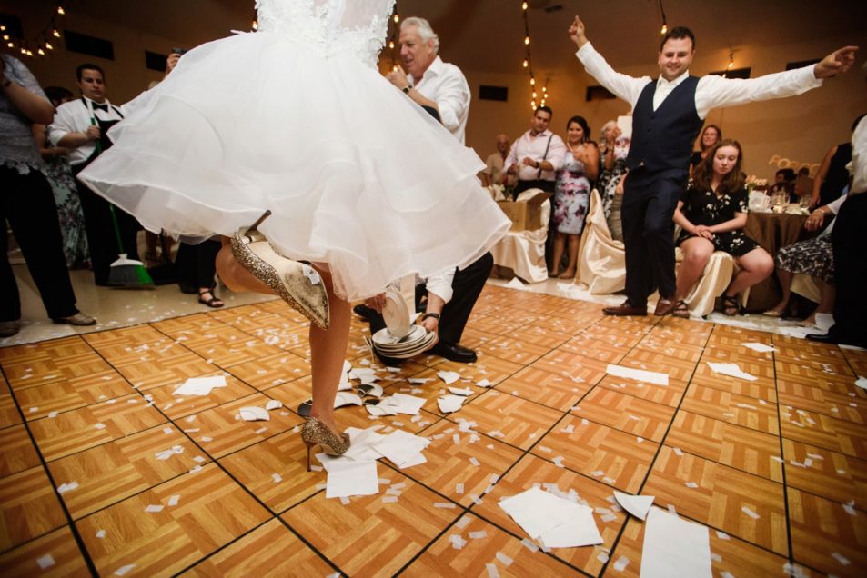 Breaking the plates // Greek Wedding Victoria BC // Photos by FunkyTown Photography Victoria BC