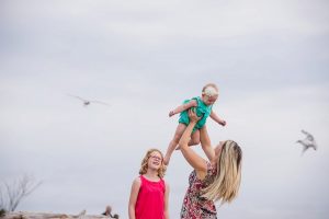 Natural and candid family portraits at the Esquimalt Lagoon in Victoria British Columbia by photographer Christina Craft.