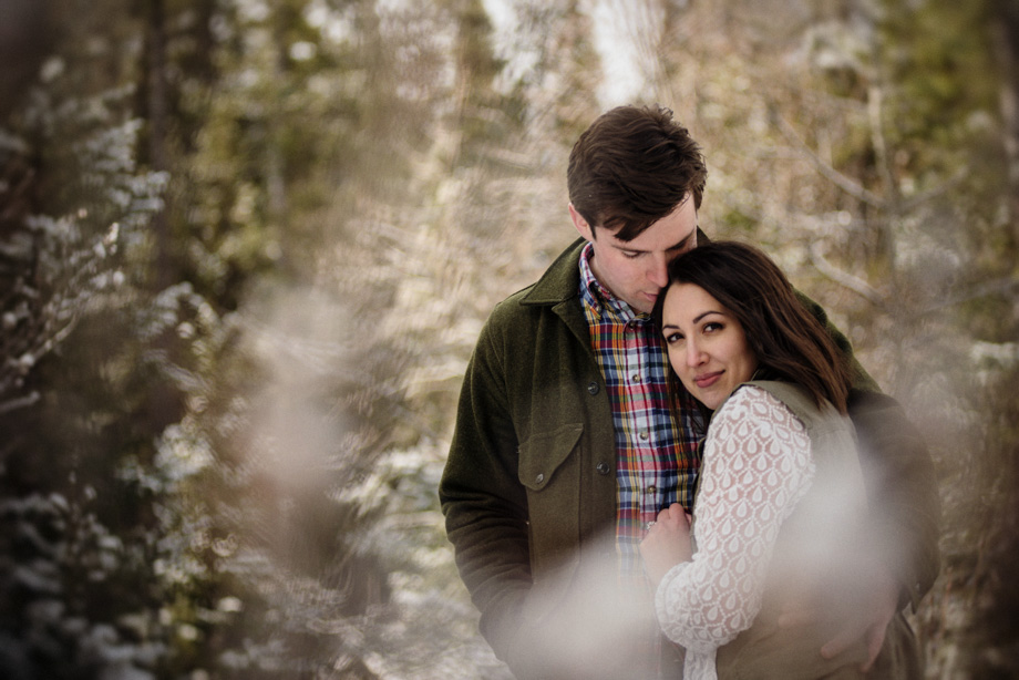 Portraits in winter and snow near Canmore Alberta at Spray Lakes Kananaskis and Quarry Lake Park. Engagement session photos by professional Canmore wedding photographer.